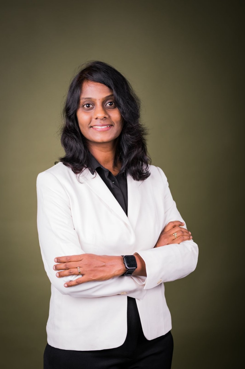 Saranya M. Vinoth in a white blazer